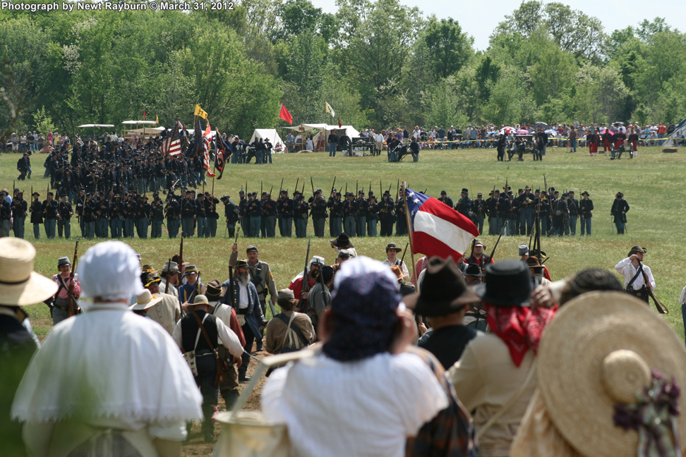 Southern Belles look on as Union forces advance. Photograph by Newt Rayburn © March 31, 2012