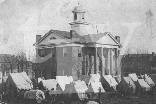 The men of an Illinois regiment of the Union army camped around the Oxford, Mississippi courthouse in December 1862. This is the only known photograph of Oxford's original courthouse and is authenticated for The Local Voice by President Grant's Library.